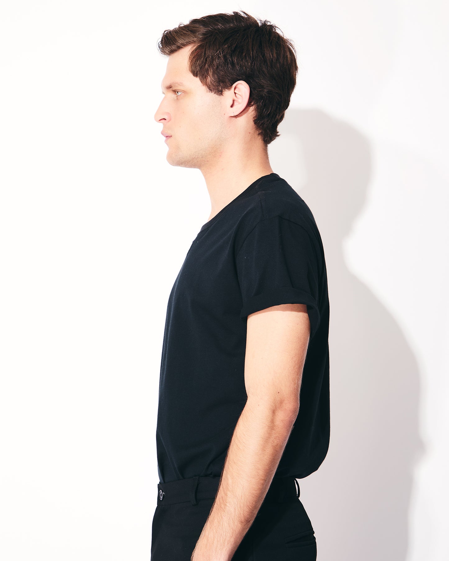 POLERA ALGODON NEGRA UNISEX - SEBASTIANA PICA BOLSILLO