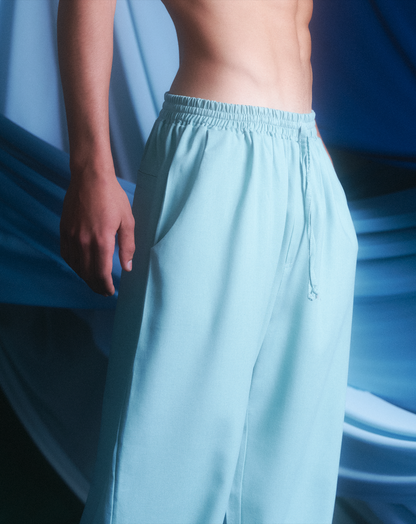 PANTALÓN UNISEX LINO TURQUESA CONJUNTO BARREL.