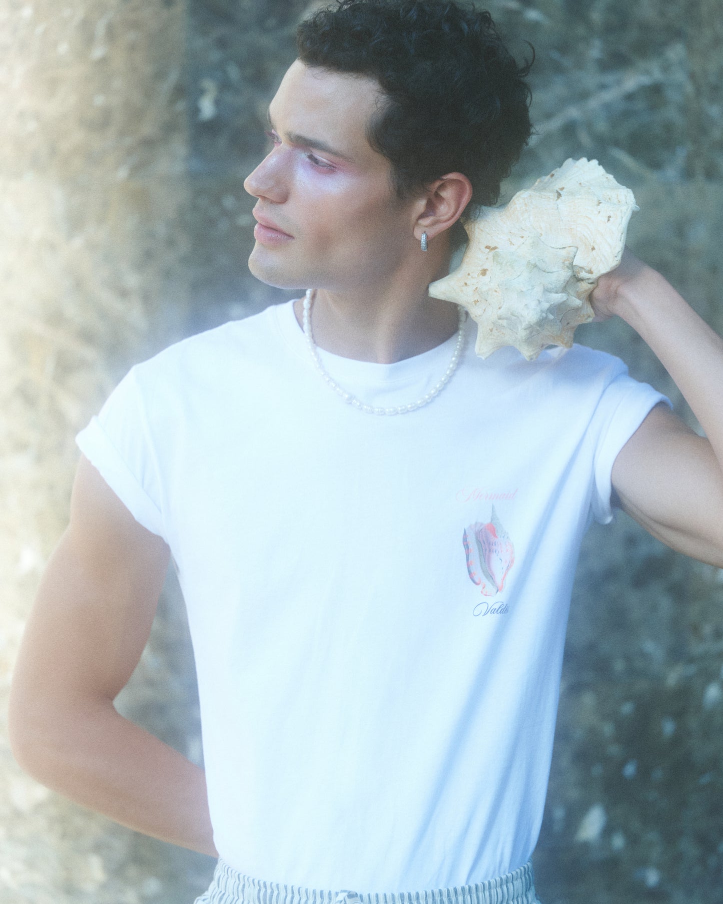 POLERA ALGODON NEGRA UNISEX   BOLSILLO CONCHA- SEBASTIANA.